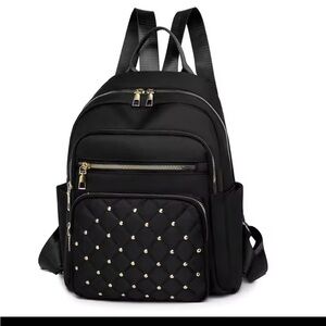 Elegant Black Quilted Backpack